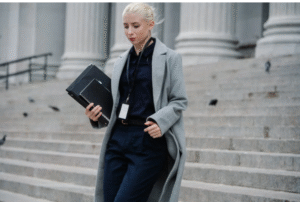 Lawyer walking down the stairs at the courthouse. 